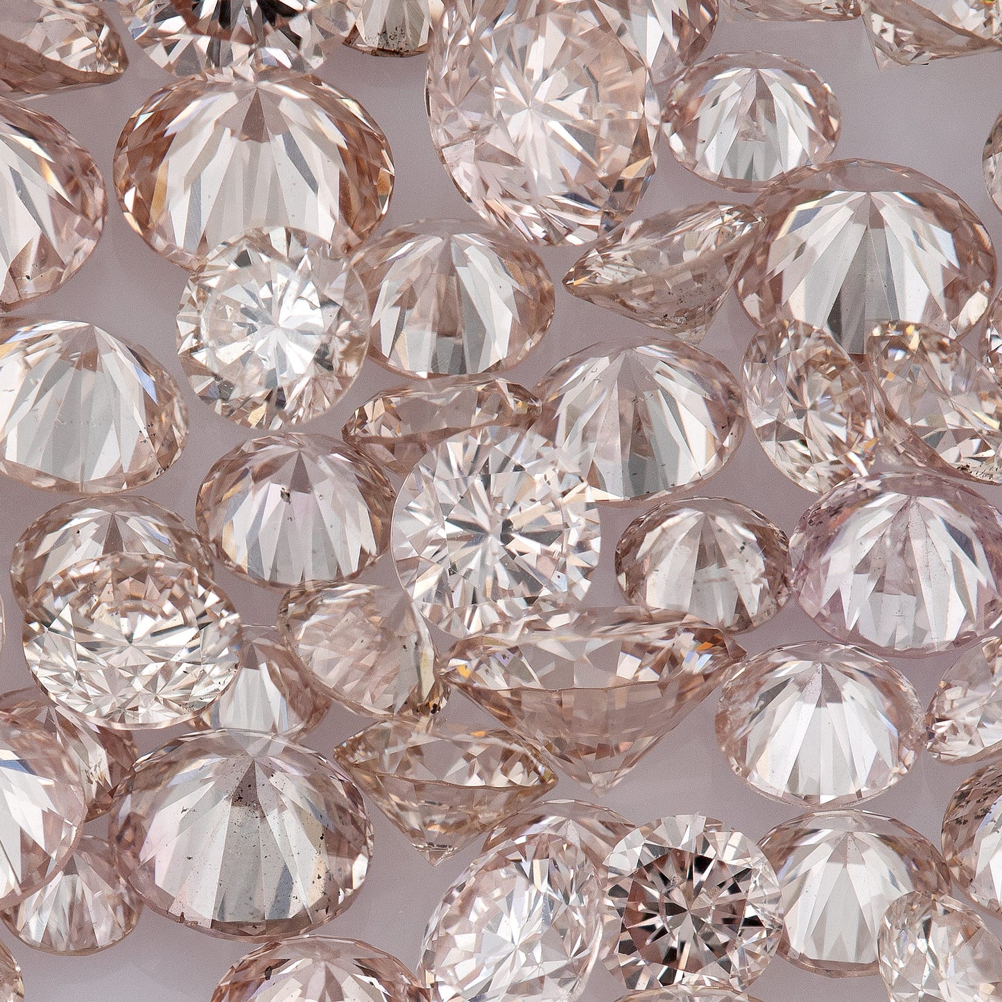 Fancy Light Pink Rose (9-8PR) | Argyle Pink Rosé Diamonds | Pink Untreated Natural Diamonds | Round | Melee | Accents | Cape Yellow