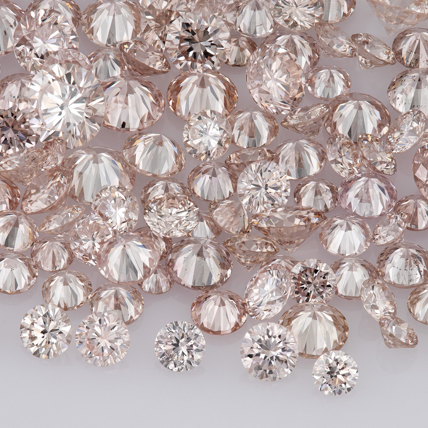 Fancy Light Pink Rose (9-8PR) | Argyle Pink Rosé Diamonds | Pink Untreated Natural Diamonds | Round | Melee | Accents | Cape Yellow