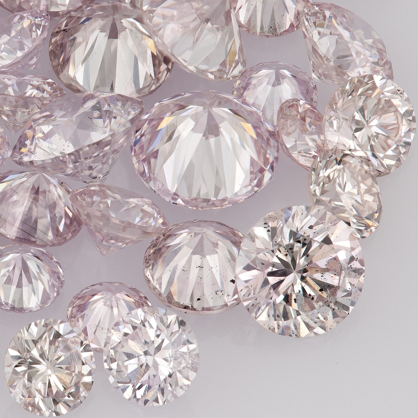 Light Purplish Pink (8-9PP/PR) | Argyle Purplish Pink Diamonds | Pink Untreated Natural Diamonds | Round | Melee | Accents | Cape Yellow