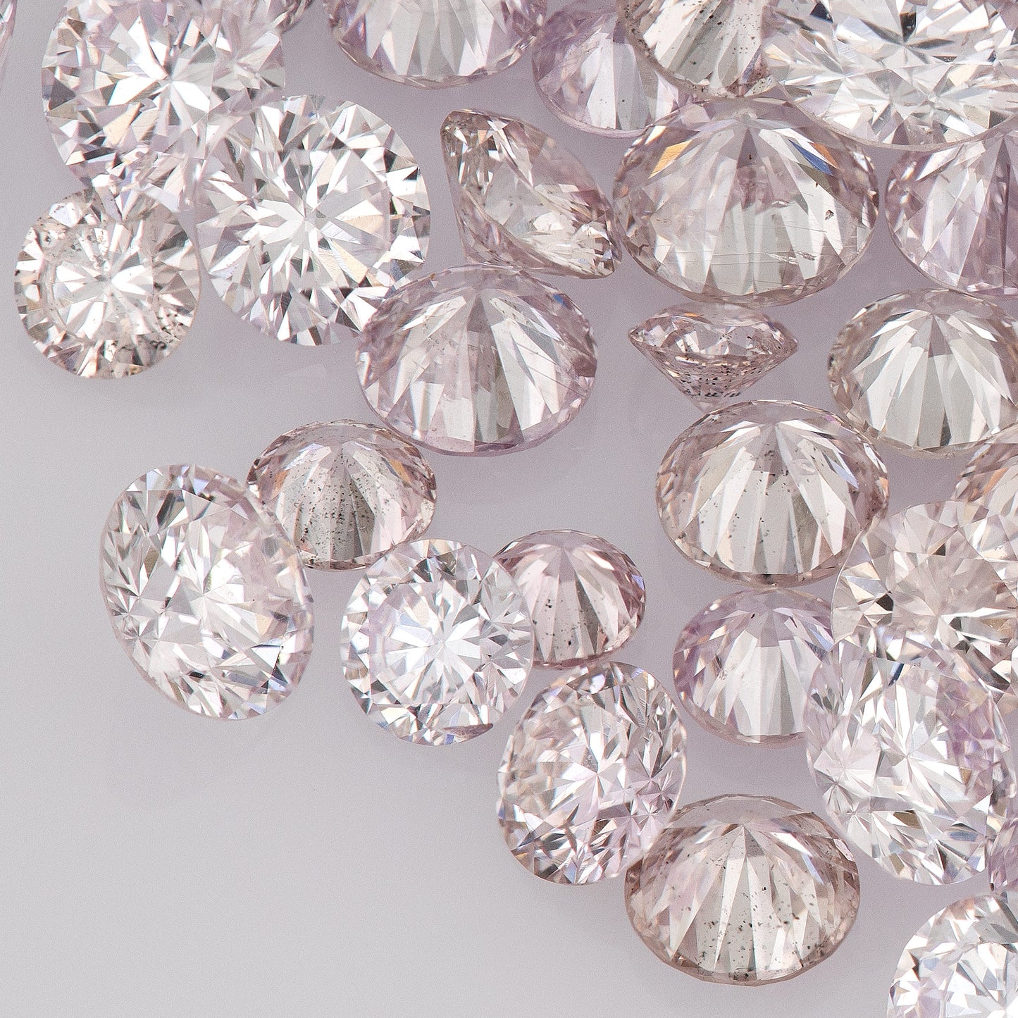 Light Purplish Pink (8-9PP/PR) | Argyle Purplish Pink Diamonds | Pink Untreated Natural Diamonds | Round | Melee | Accents | Cape Yellow