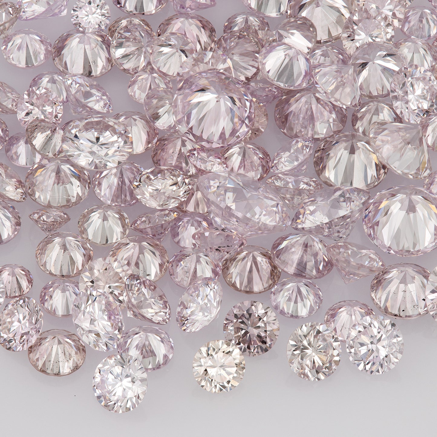 Light Purplish Pink (8-9PP/PR) | Argyle Purplish Pink Diamonds | Pink Untreated Natural Diamonds | Round | Melee | Accents | Cape Yellow