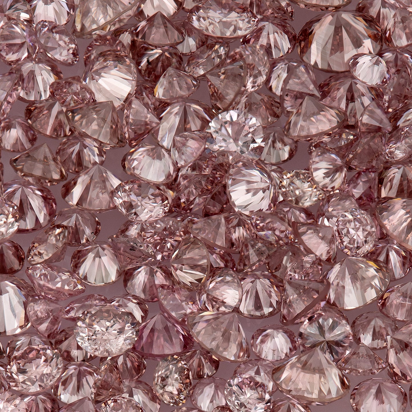 Fancy Vivid Pink Rose (6/5PR) | Argyle Pink Diamonds Select | Untreated Natural Pink Diamonds | Round Melee Accents