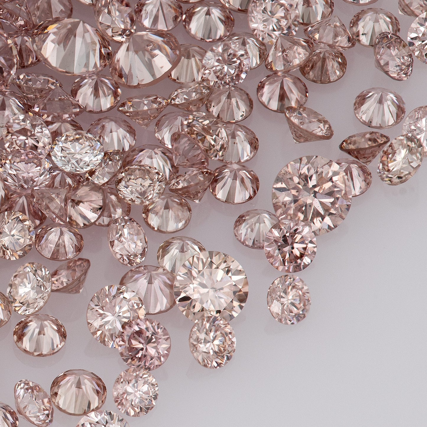Fancy Intense Pink Rose 7-6PR | Argyle Pink Diamonds Select | Untreated Natural Pink Diamonds | Round Melee Accents