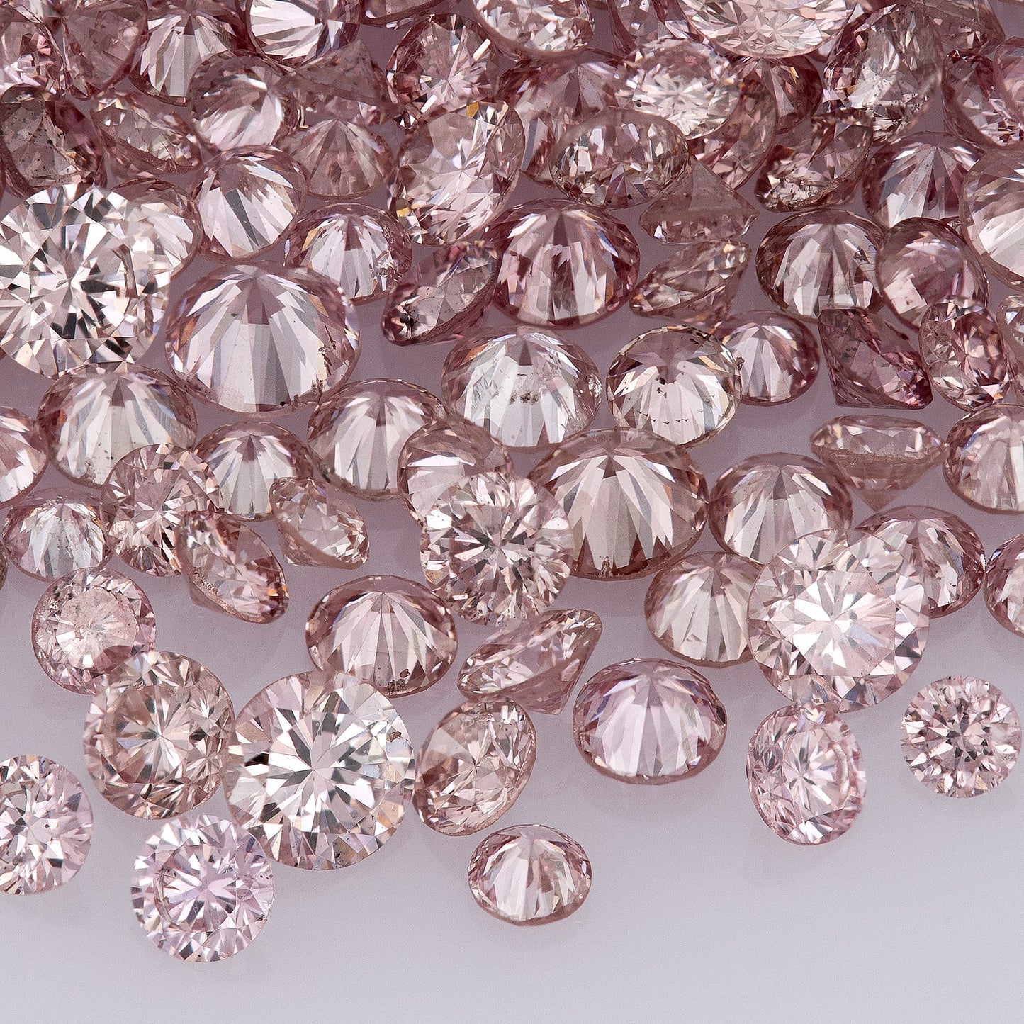 Fancy Intense Pink Rose 6PR | Argyle Pink Diamonds Select | Untreated Natural Pink Diamonds | Round Melee Accents