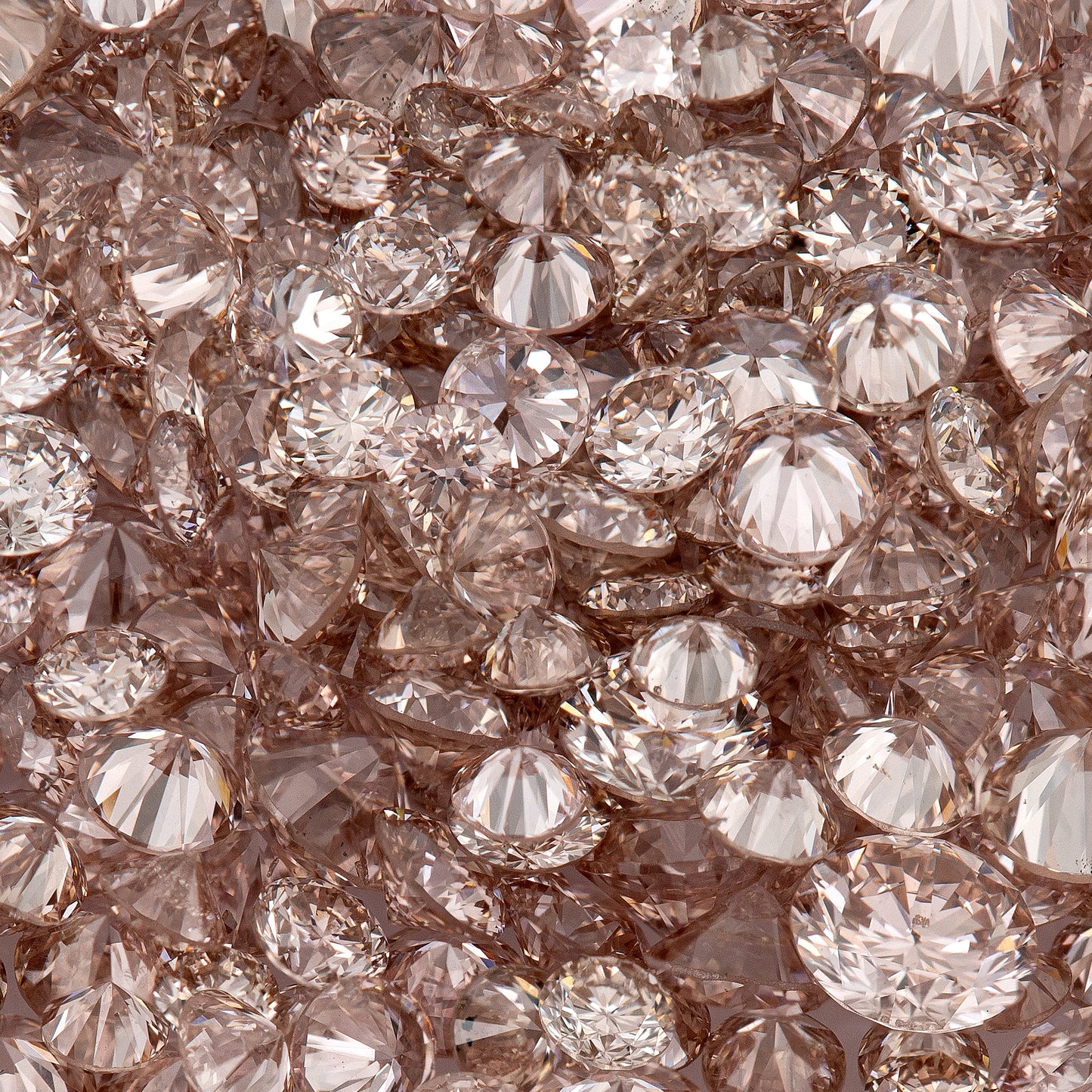 Fancy Intense Pink Champagne AA PC1 | Argyle Pink Diamonds Select | Untreated Natural Pink Diamonds | Round Melee Accents