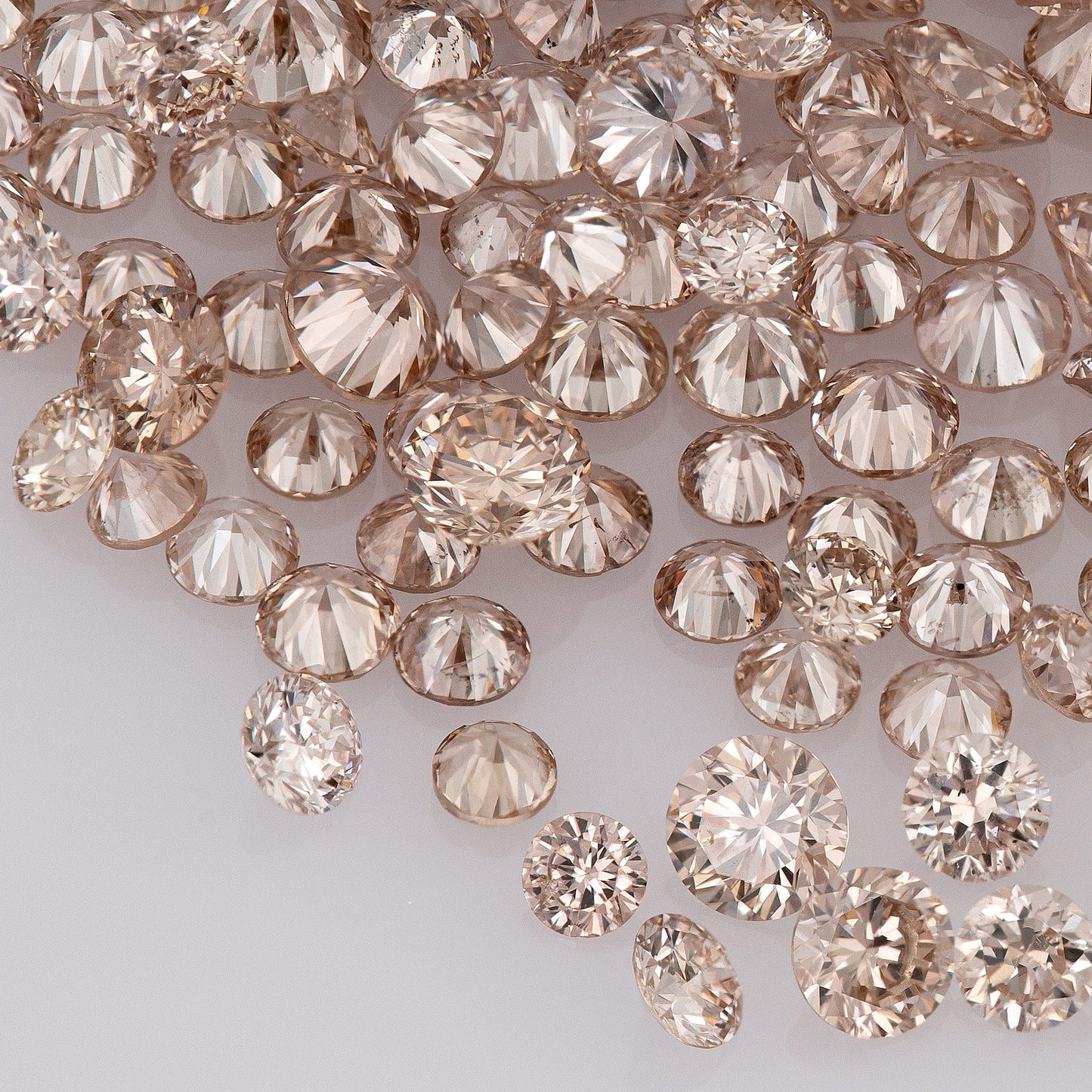 Fancy Intense Pink Champagne AAA PC1 | Argyle Pink Diamonds Select | Untreated Natural Pink Diamonds | Round Melee Accents