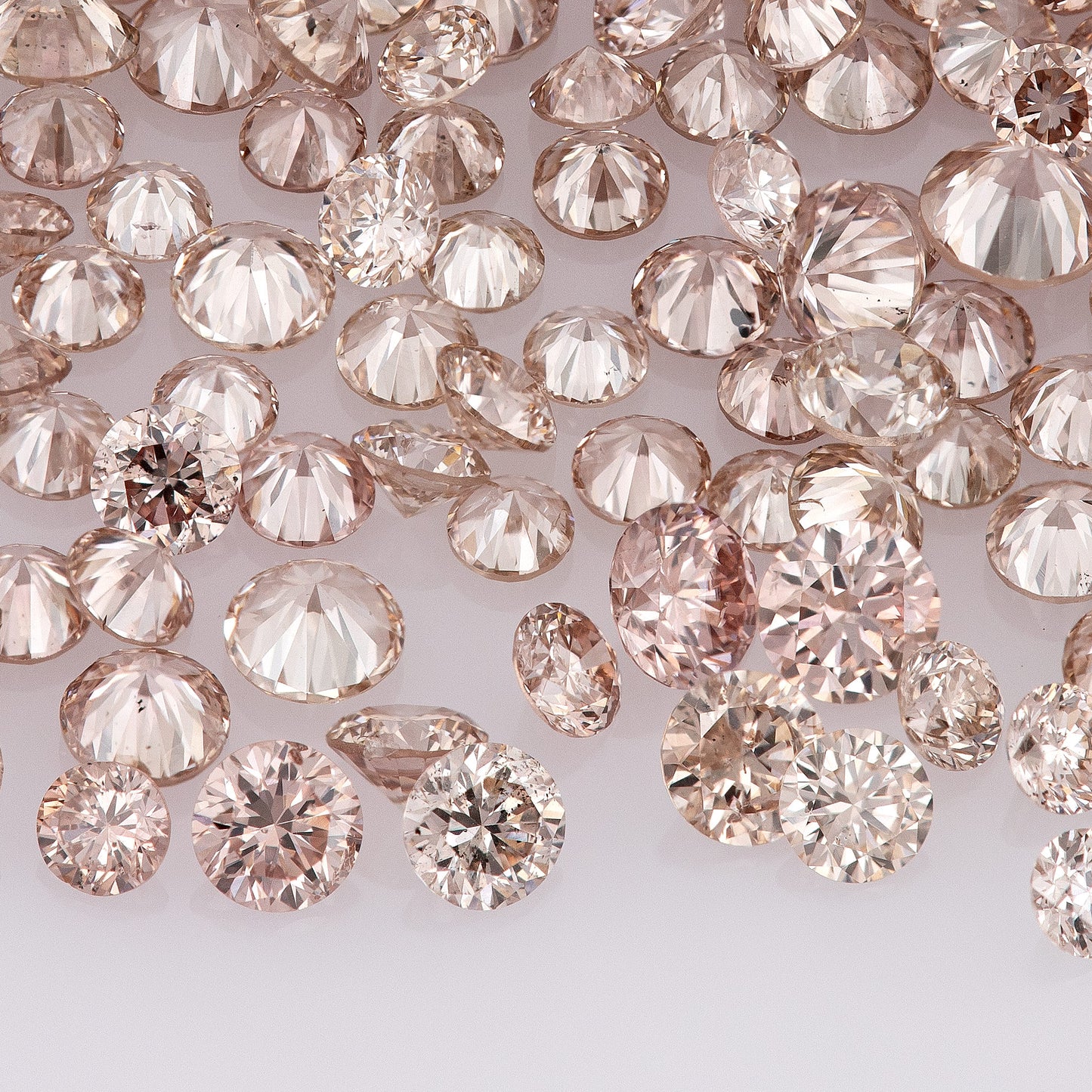 Fancy Pink Champagne PC1 | Argyle Pink Diamonds Select | Untreated Natural Pink Diamonds | Round Melee Accents