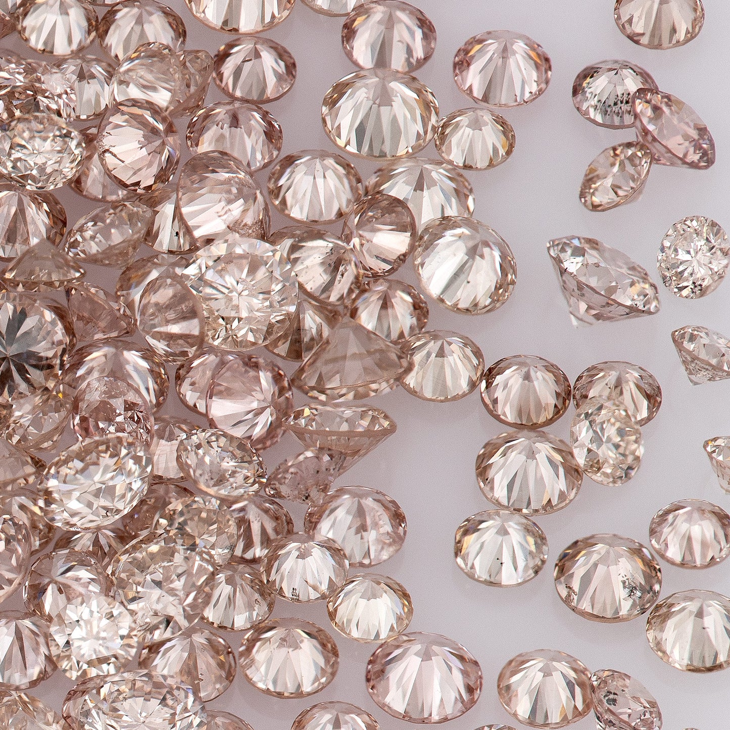 Fancy Pink Champagne PC1 | Argyle Pink Diamonds Select | Untreated Natural Pink Diamonds | Round Melee Accents