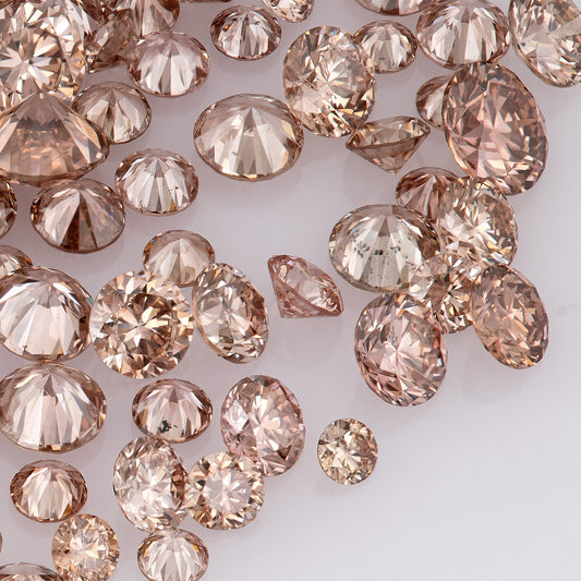 Fancy Intense Pink Champagne PC1/2 | Argyle Pink Diamonds Select | Chocolate Argyle Pink Diamond | Untreated Natural Pink Diamond | Round Melee Accents