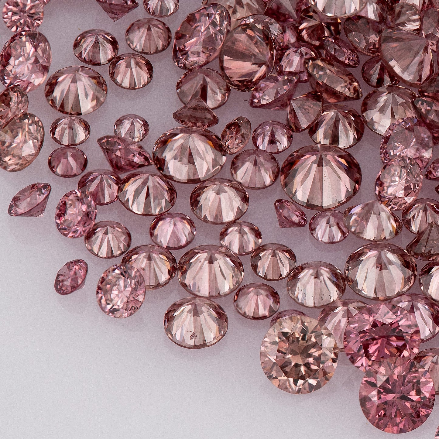 Fancy VIVID Reddish/Pink Rose Argyle (PR5-3 - PC2-3) | Argyle Pink Diamonds Select | Untreated Natural Pink Diamond | Round Melee Accents