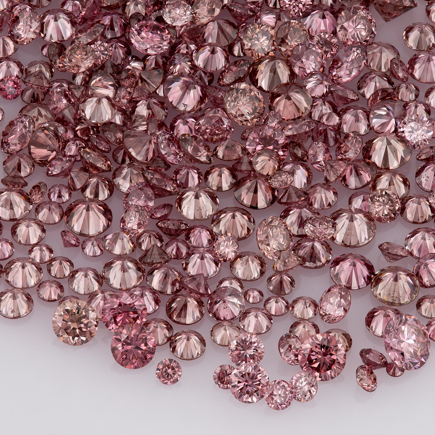 Fancy VIVID Reddish/Pink Rose Argyle (PR5-3 - PC2-3) | Argyle Pink Diamonds Select | Untreated Natural Pink Diamond | Round Melee Accents