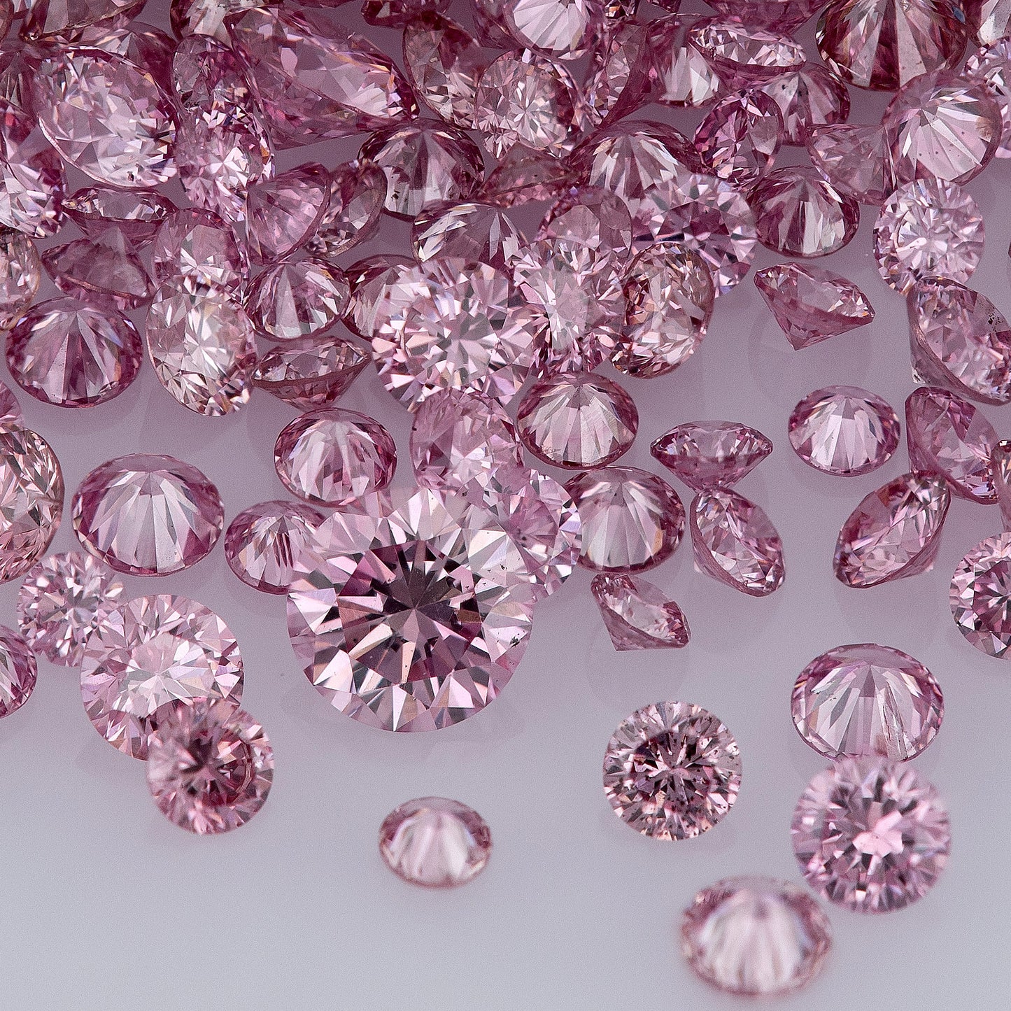 Fancy Vivid+ Purplish Pink 3/2PP AA | Argyle Vivid Purple Pink Diamonds Select | Vivid Pink Diamonds | Untreated Natural Pink Diamond Round | Melee | Accents | Argyle