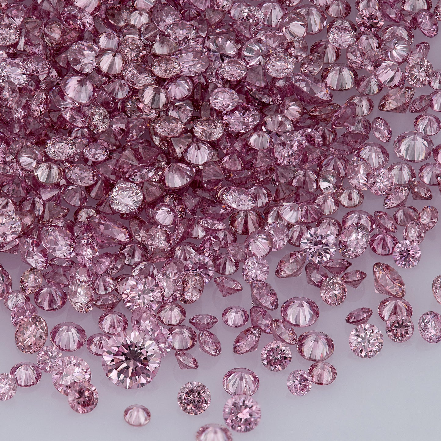 Fancy Vivid+ Purplish Pink 3/2PP AA | Argyle Vivid Purple Pink Diamonds Select | Vivid Pink Diamonds | Untreated Natural Pink Diamond Round | Melee | Accents | Argyle