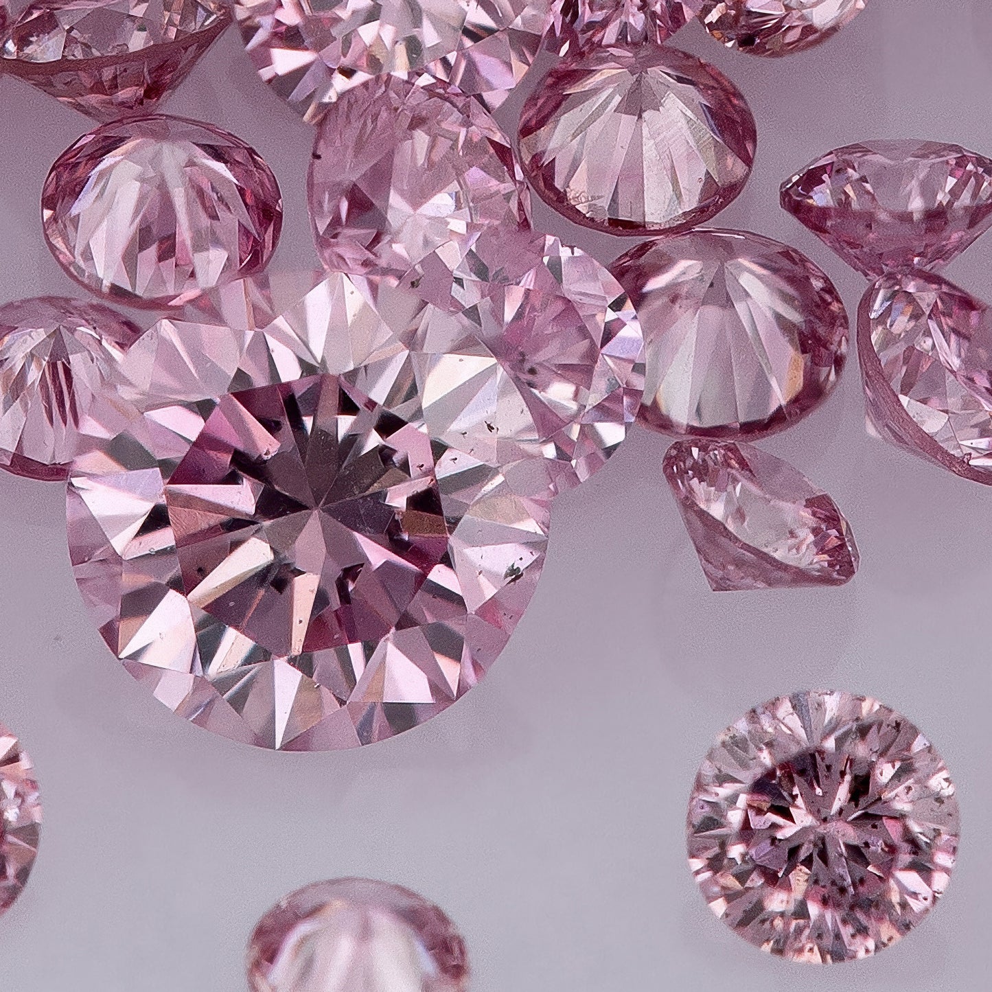 Fancy Vivid+ Purplish Pink 3/2PP AA | Argyle Vivid Purple Pink Diamonds Select | Vivid Pink Diamonds | Untreated Natural Pink Diamond Round | Melee | Accents | Argyle