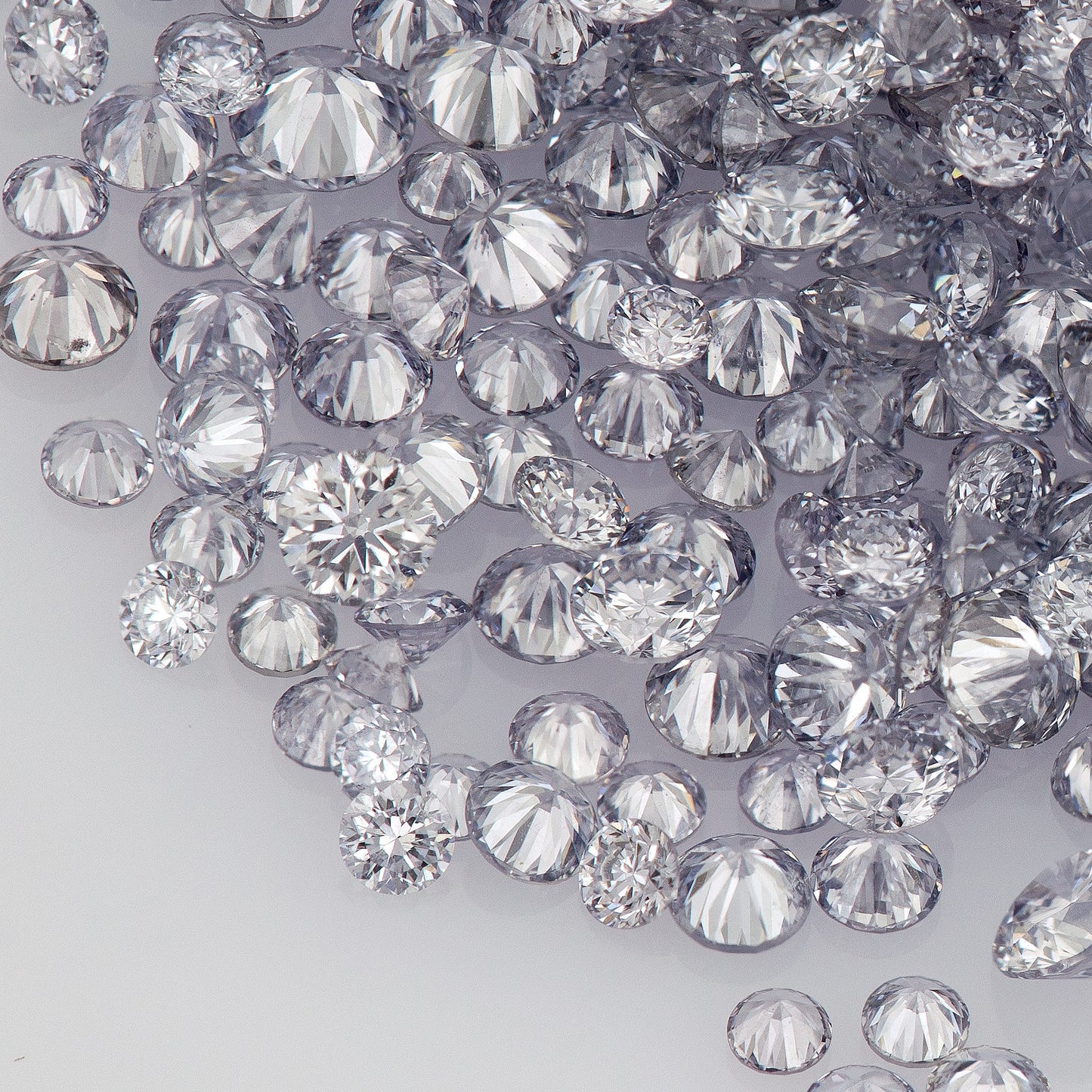 Fancy Intense Blue Violet BL2 | Argyle Violet Blue Diamonds | Select | Australian | Untreated Natural | Round Melee Accents