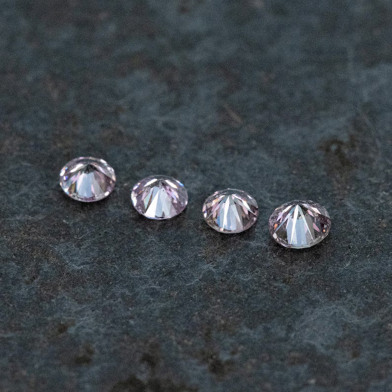 2.2 - 2.0 mm Fancy Vivid Purplish Pink Natural Pink Diamonds Round Brilliant SI1 0.15ct. Untreated 100% Natural