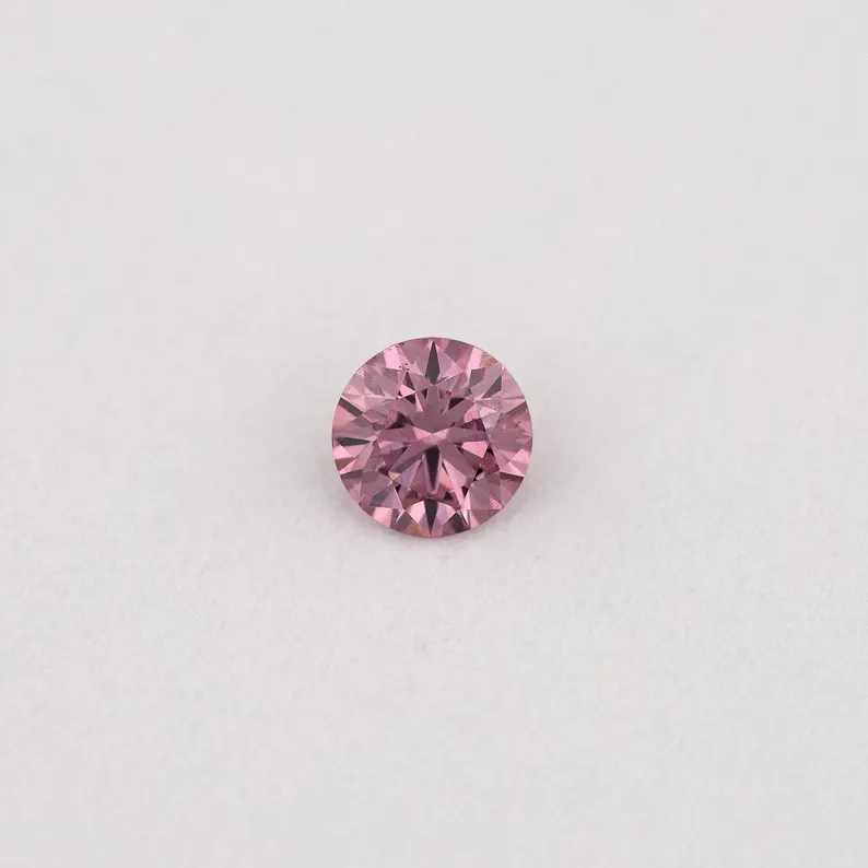 GIA Certified 0.06ct Fancy Intense Purplish Pink Natural Argyle Pink Diamond Round Brilliant VS2