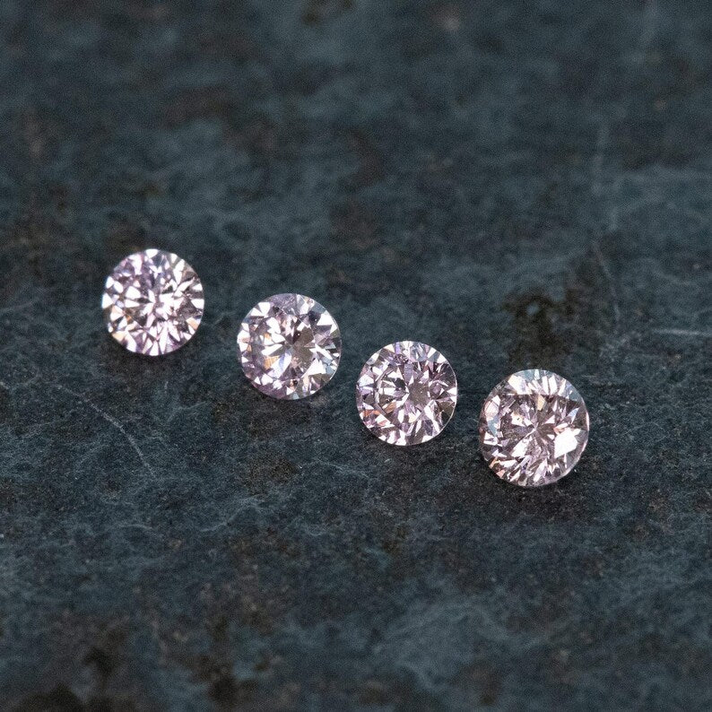 2.2 - 2.0 mm Fancy Vivid Purplish Pink Natural Pink Diamonds Round Brilliant SI1 0.15ct. Untreated 100% Natural