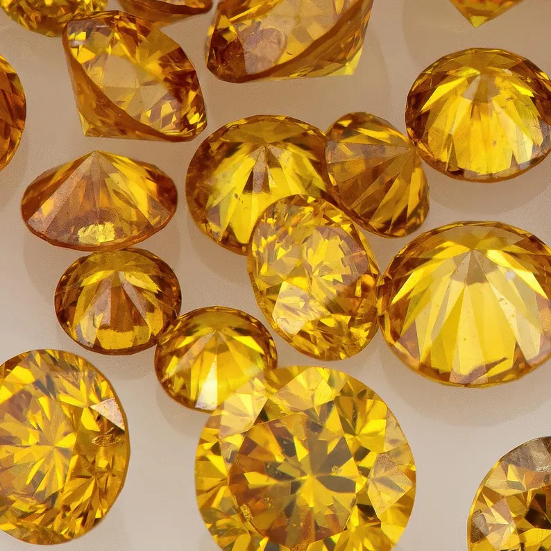 Fancy Vivid Yellowish Reddish Orange | Natural Untreated Diamonds | Round | Melee | Accents