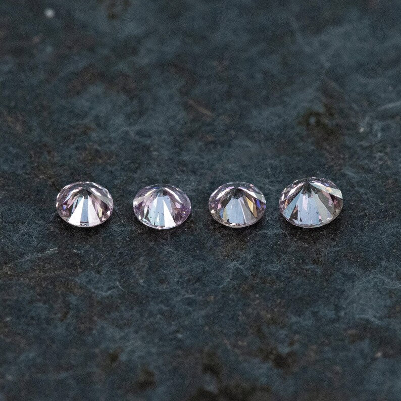 2.2 - 2.0 mm Fancy Vivid Purplish Pink Natural Pink Diamonds Round Brilliant SI1 0.15ct. Untreated 100% Natural