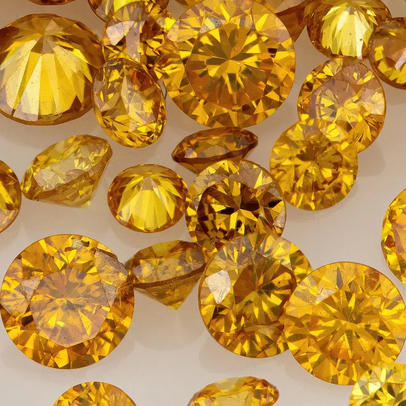 Fancy Vivid Yellowish Reddish Orange | Natural Untreated Diamonds | Round | Melee | Accents