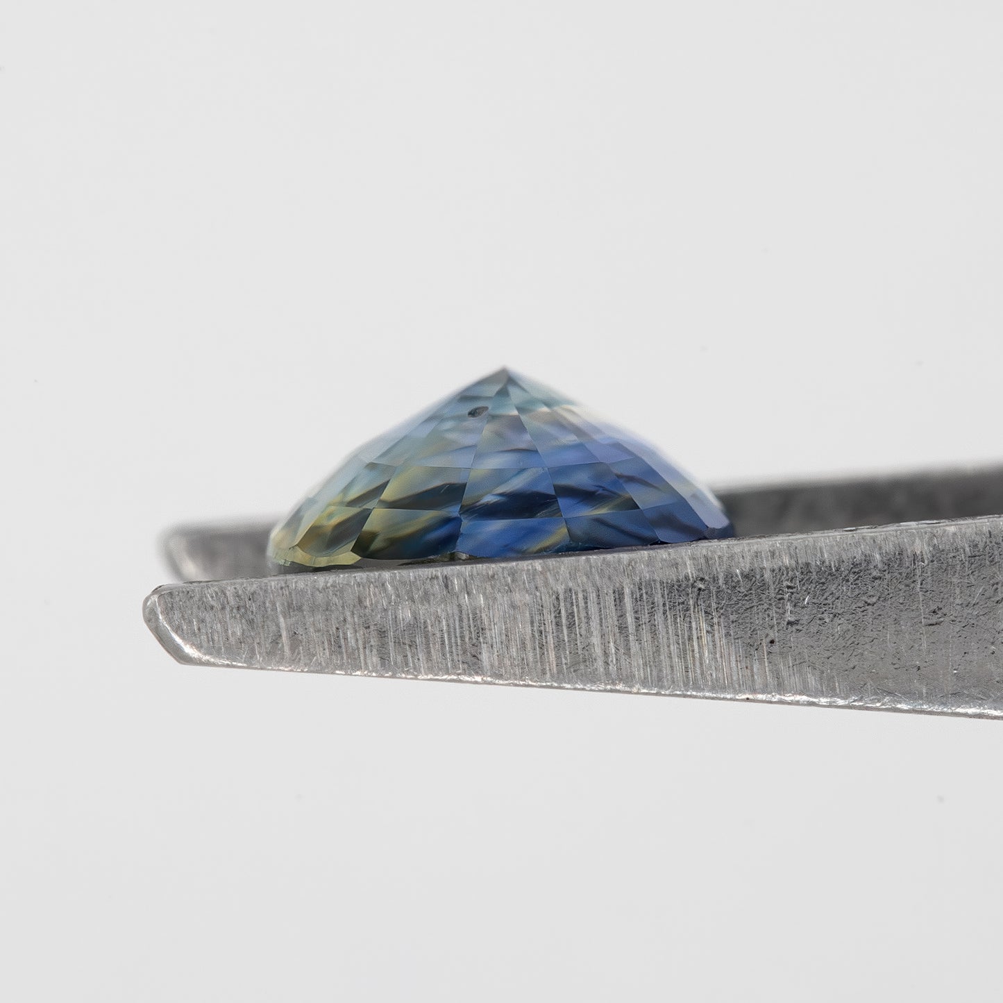 Muted Blue Champagne Bicolor Sapphire | 1.47 Ct Natural Unheated Oval Cut | Eye Clean Gemstone for Fine Jewelry & Rings