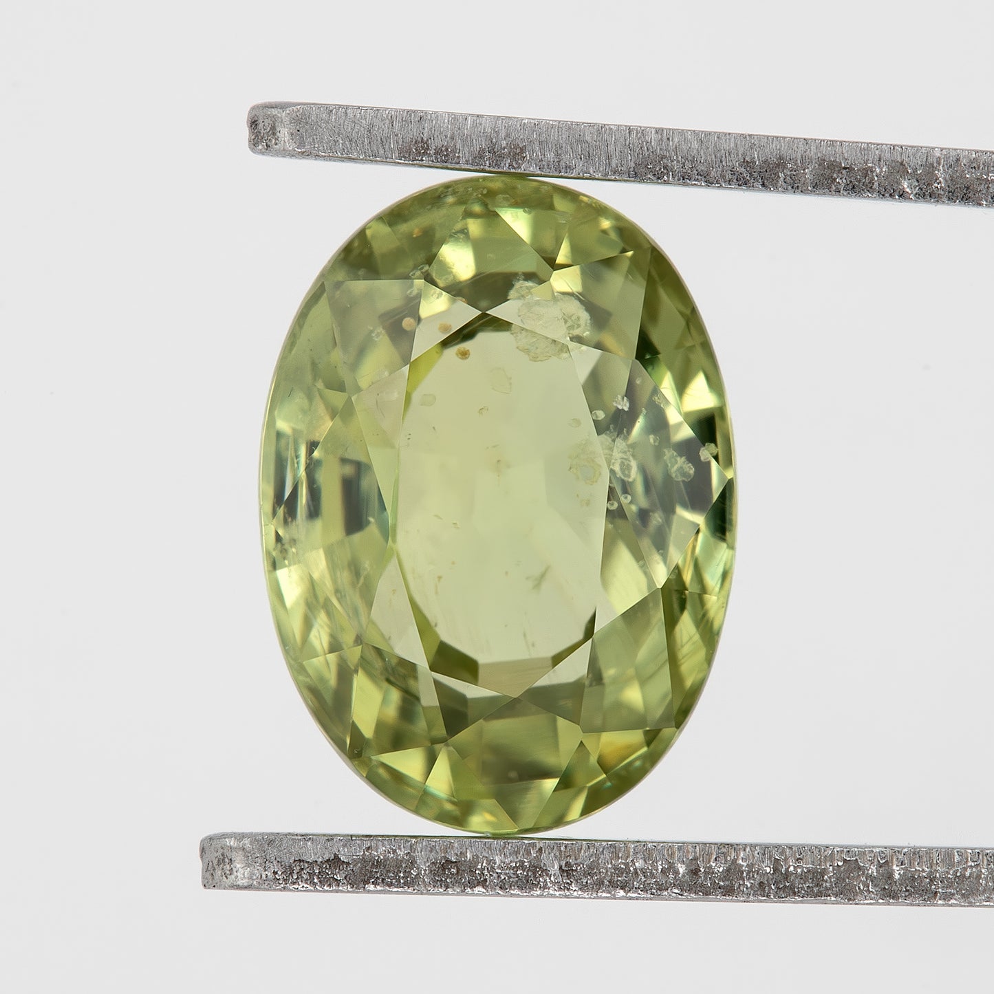 Vibrant Chartreuse Green Natural Sapphire 1.74 Ct | Oval Cut Heated Loose Gemstone | Eye Visible Inclusions | Unique Stone for Statement Ring or Pendant Design