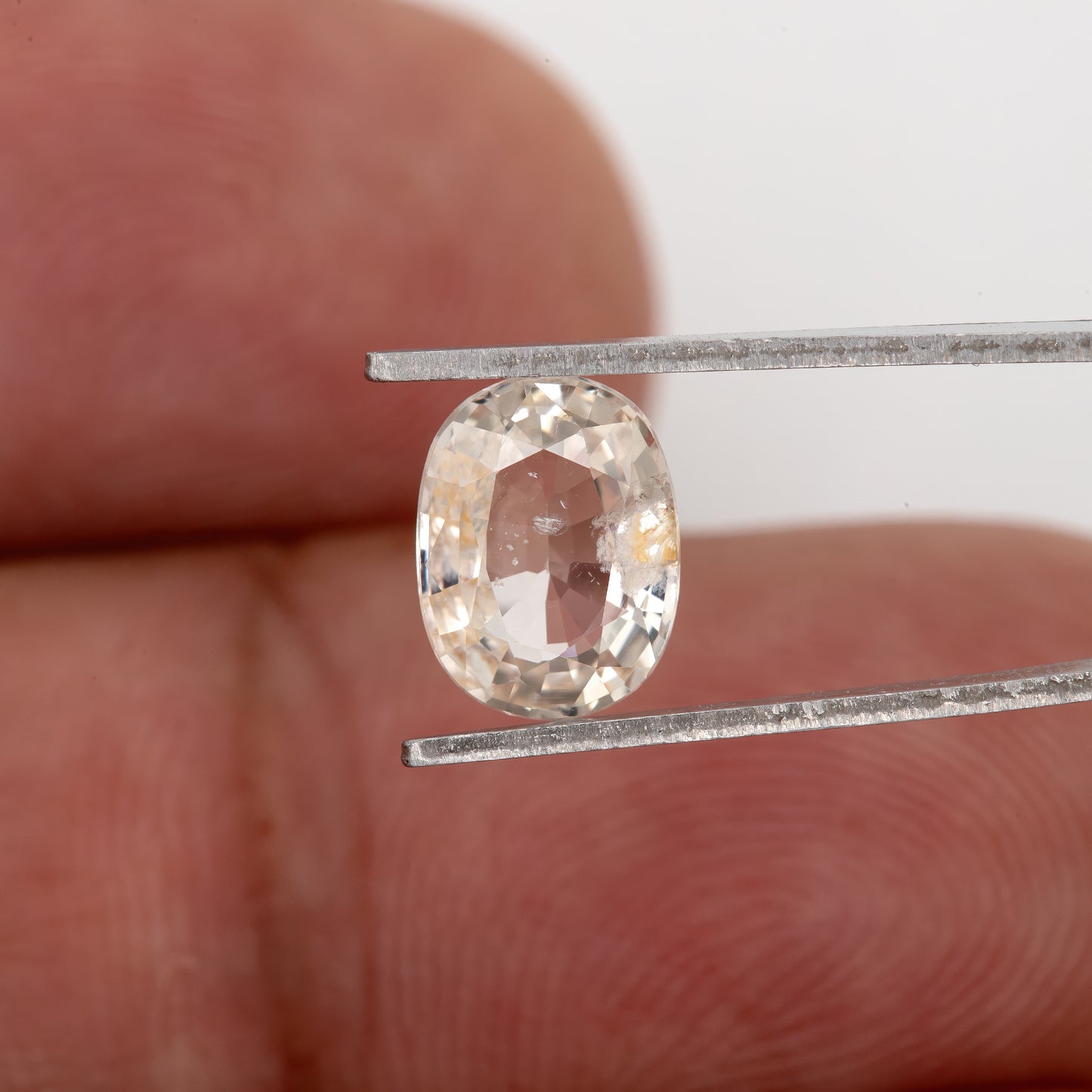 Champagne Cream | 1.74 Carat Oval Cut Heated Natural Sapphire with Rustic Eye Inclusions for Custom Jewelry Design