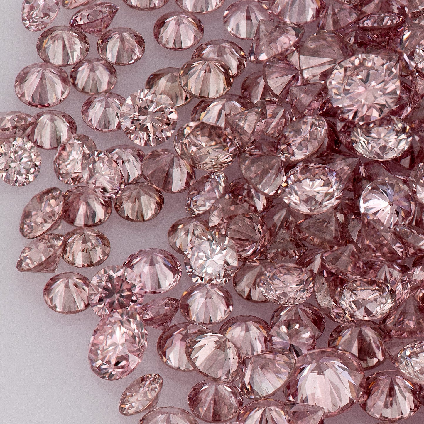 Fancy Vivid Pink Rose AA (4PR) | Argyle Vivid Pink Rose Diamonds | Argyle Pink Diamond | Untreated Natural Pink Diamonds | Round | Melee | Accents | Argyle