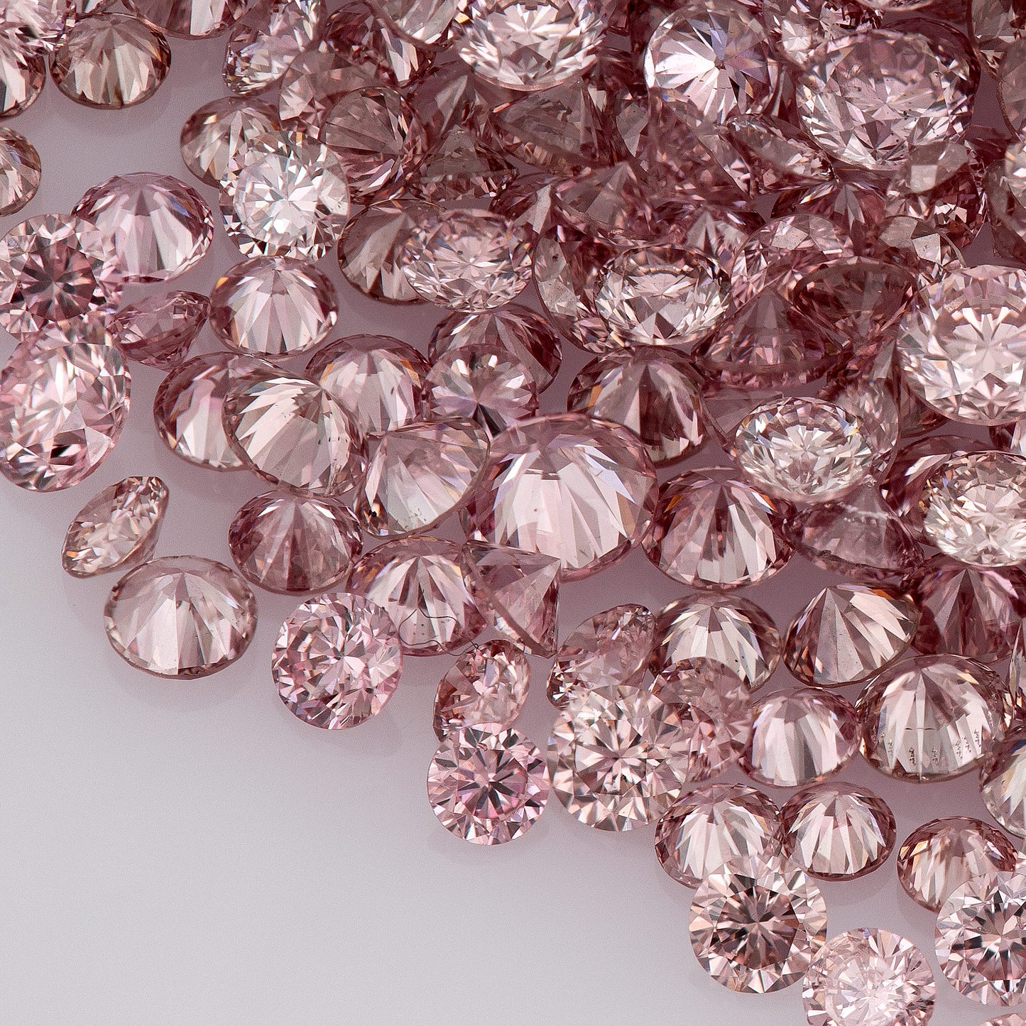 Fancy Vivid Pink Rose AA (4PR) | Argyle Vivid Pink Rose Diamonds | Argyle Pink Diamond | Untreated Natural Pink Diamonds | Round | Melee | Accents | Argyle