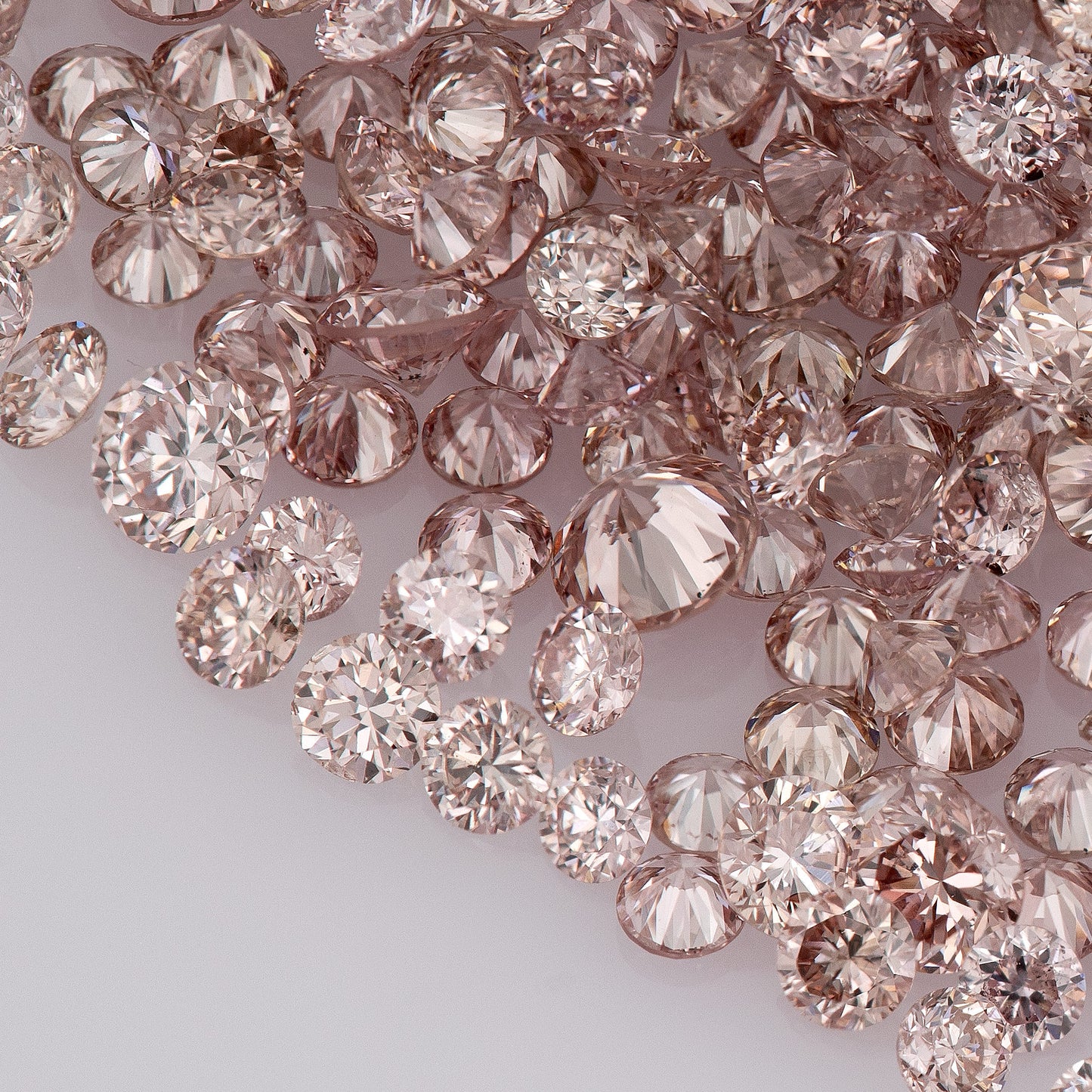 Fancy Intense Pink Rose 7-6PR | Argyle Pink Diamonds Select | Untreated Natural Pink Diamonds | Round Melee Accents