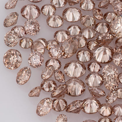 Fancy Vivid Pink Champagne PC2 | Argyle Pink Diamonds Select | Untreated Natural Pink Diamonds | Round Melee Accents