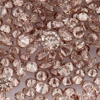 Fancy Vivid Pink Champagne PC2 | Argyle Pink Diamonds Select | Untreated Natural Pink Diamonds | Round Melee Accents