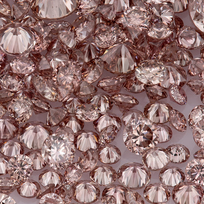 Fancy Vivid Pink Champagne PC2 | Argyle Pink Diamonds Select | Untreated Natural Pink Diamond | Round Melee Accents