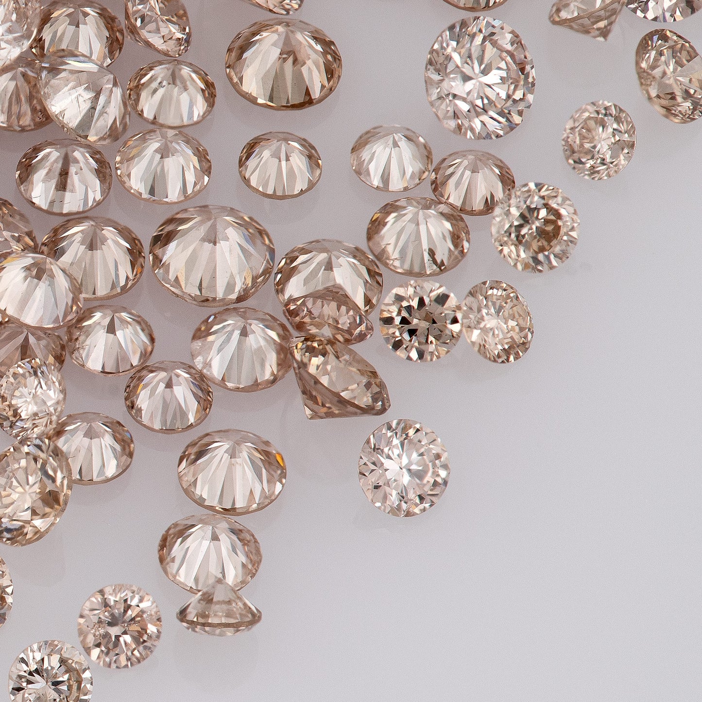 Fancy Intense Pink Champagne AAA PC1 | Argyle Pink Diamonds Select | Untreated Natural Pink Diamonds | Round Melee Accents