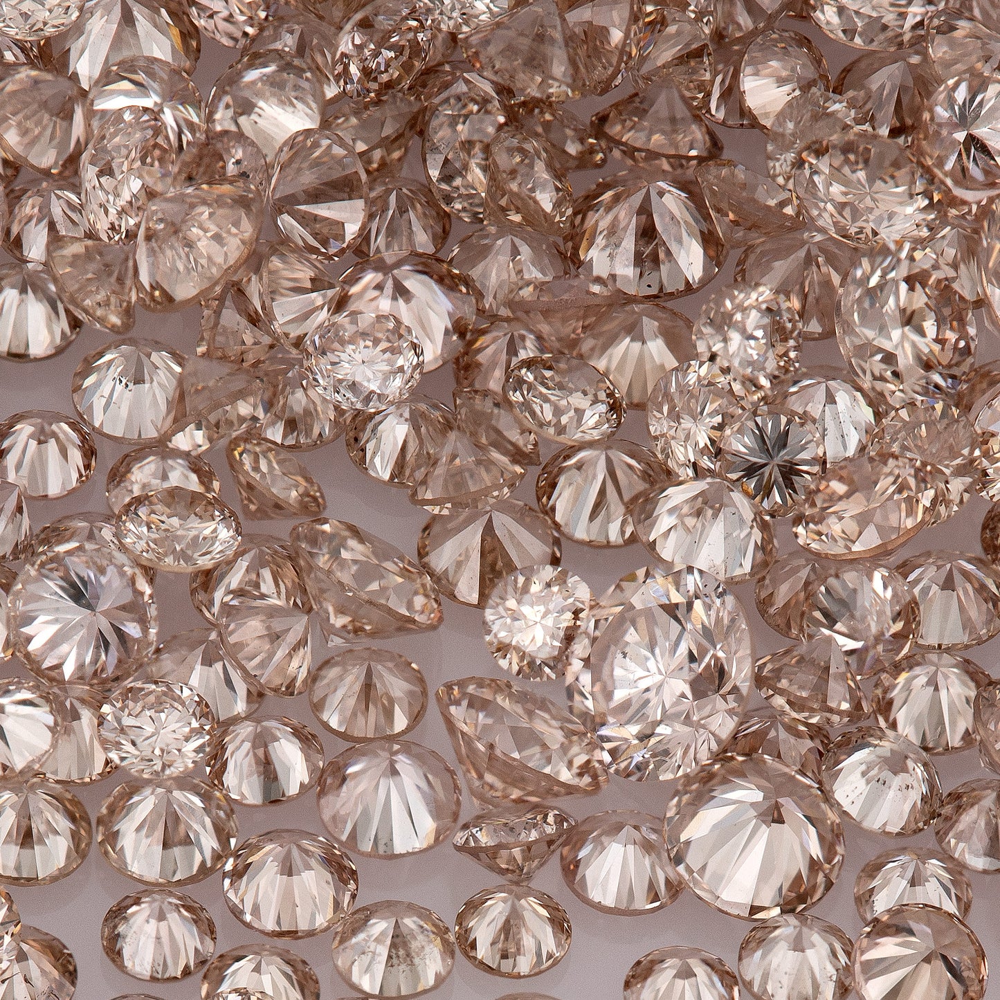 Fancy Intense Pink Champagne AAA PC1 | Argyle Pink Diamonds Select | Untreated Natural Pink Diamonds | Round Melee Accents