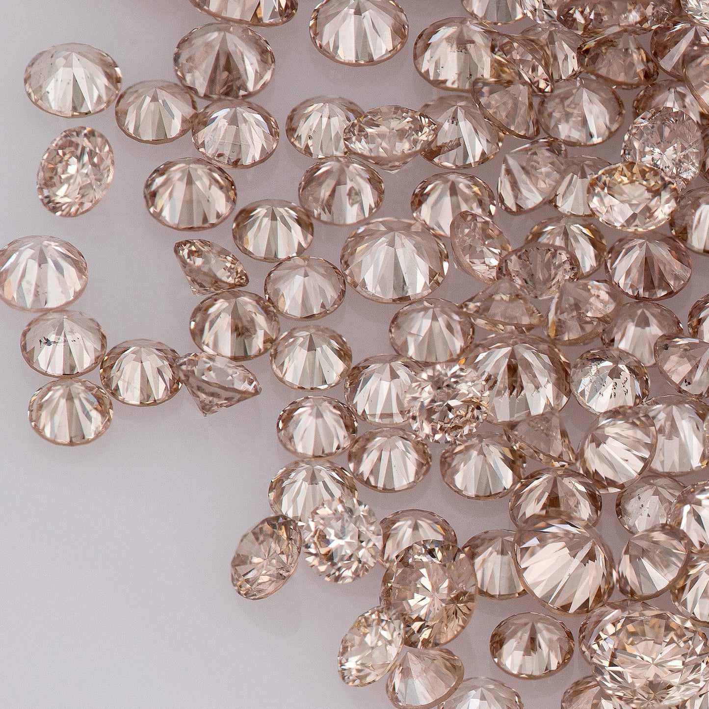 Fancy Intense Pink Champagne AAA PC1 | Argyle Pink Diamonds Select | Untreated Natural Pink Diamonds | Round Melee Accents
