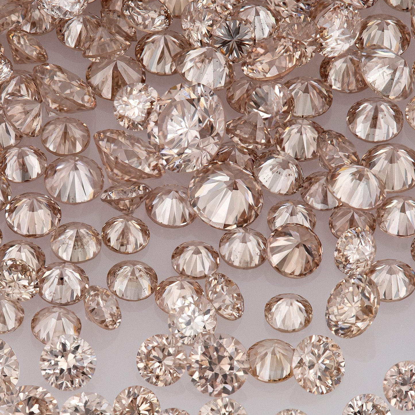 Fancy Intense Pink Champagne AAA PC1 | Argyle Pink Diamonds Select | Untreated Natural Pink Diamonds | Round Melee Accents