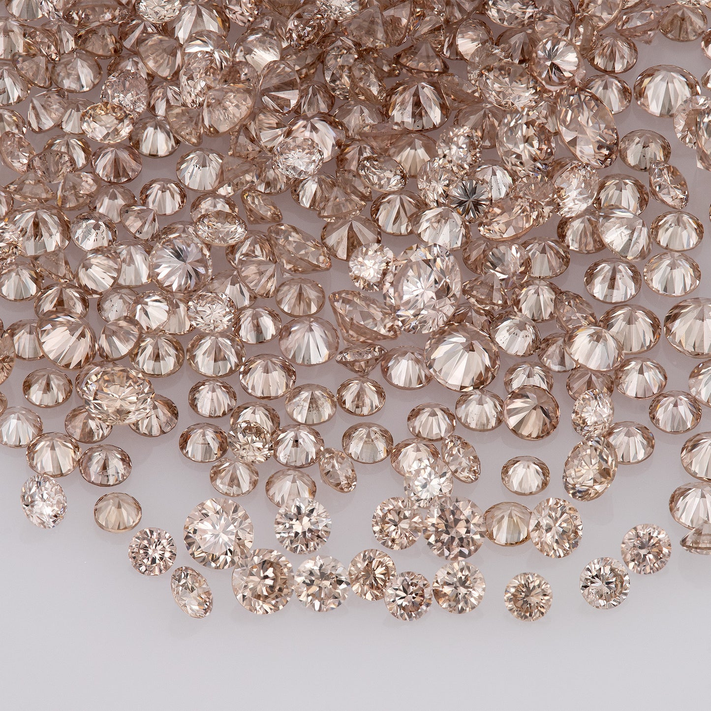 Fancy Intense Pink Champagne AAA PC1 | Argyle Pink Diamonds Select | Untreated Natural Pink Diamonds | Round Melee Accents