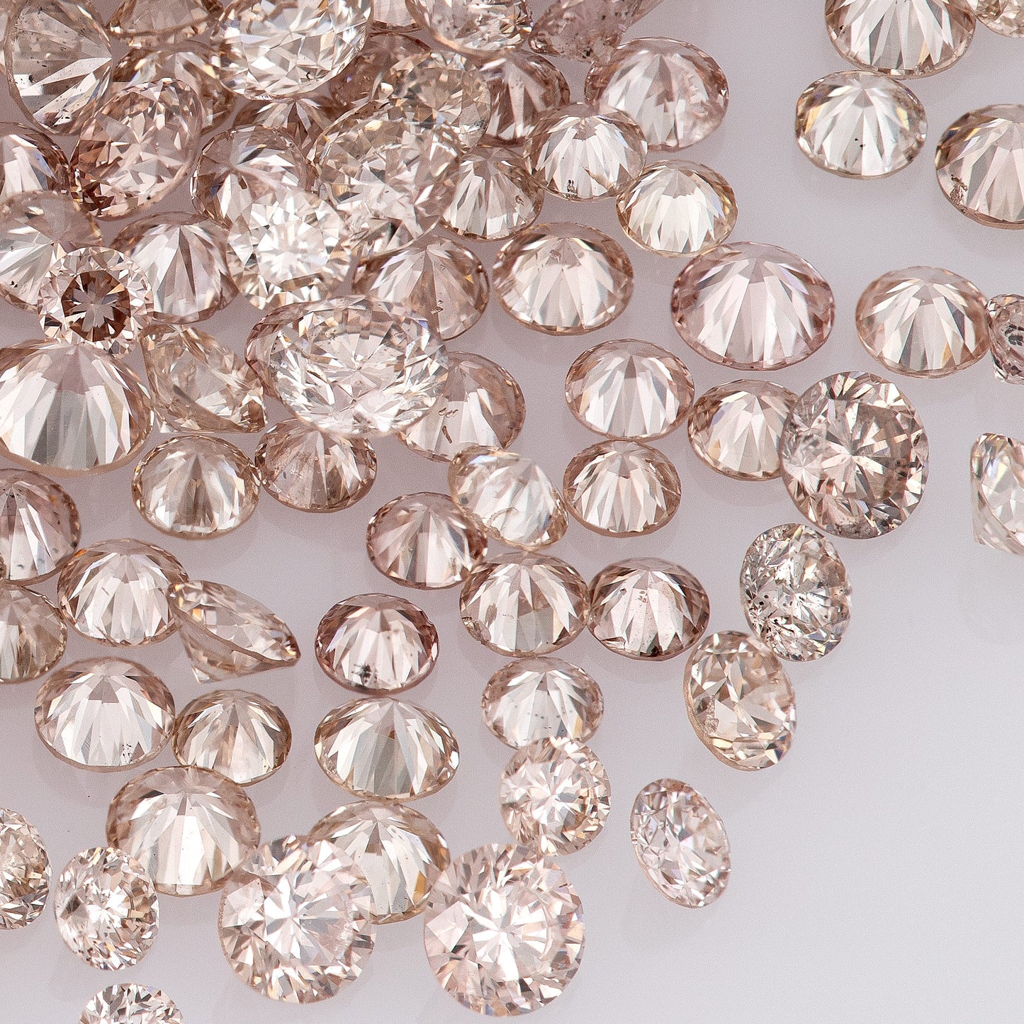 Fancy Pink Champagne PC1 | Argyle Pink Diamonds Select | Untreated Natural Pink Diamonds | Round Melee Accents