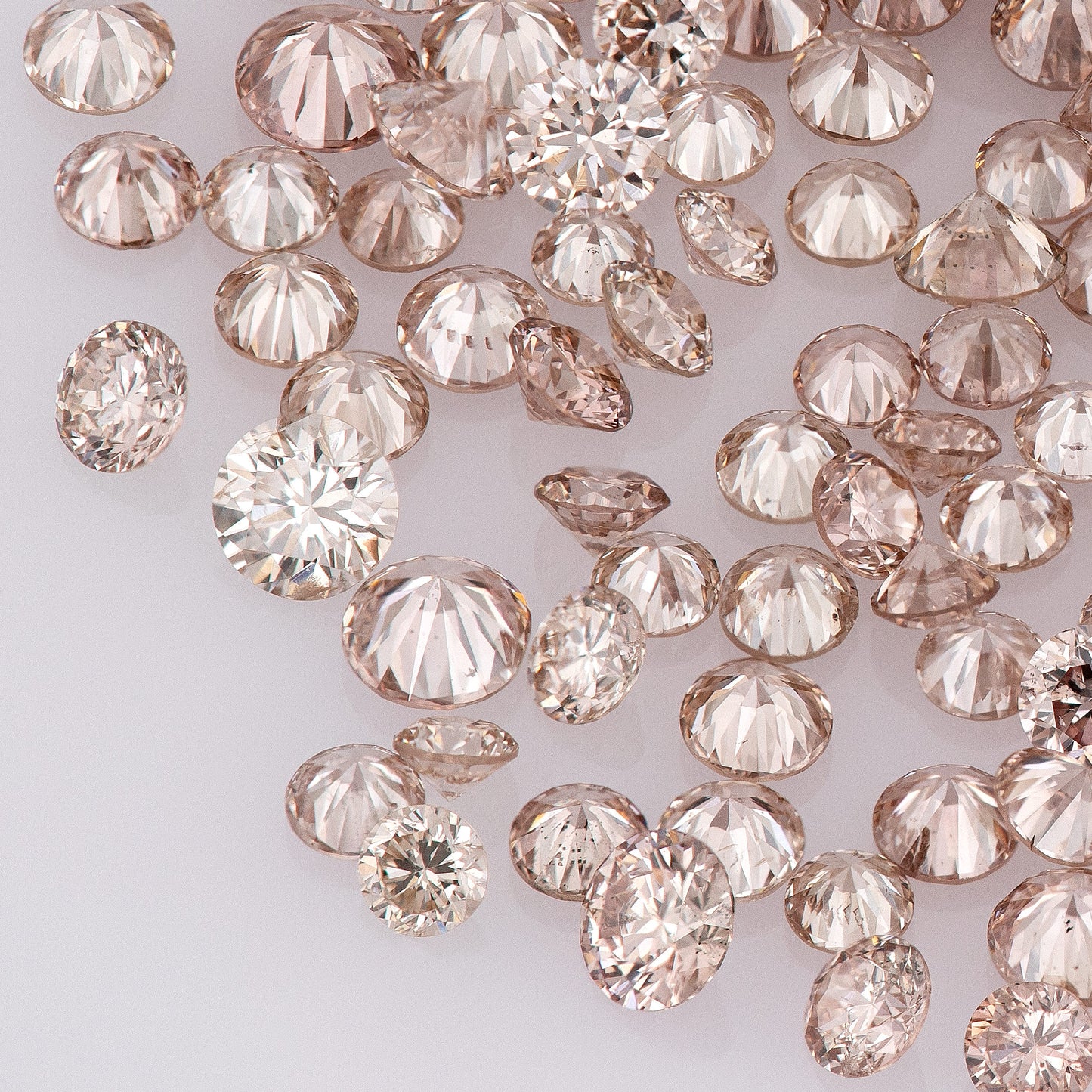 Fancy Pink Champagne PC1 | Argyle Pink Diamonds Select | Untreated Natural Pink Diamonds | Round Melee Accents