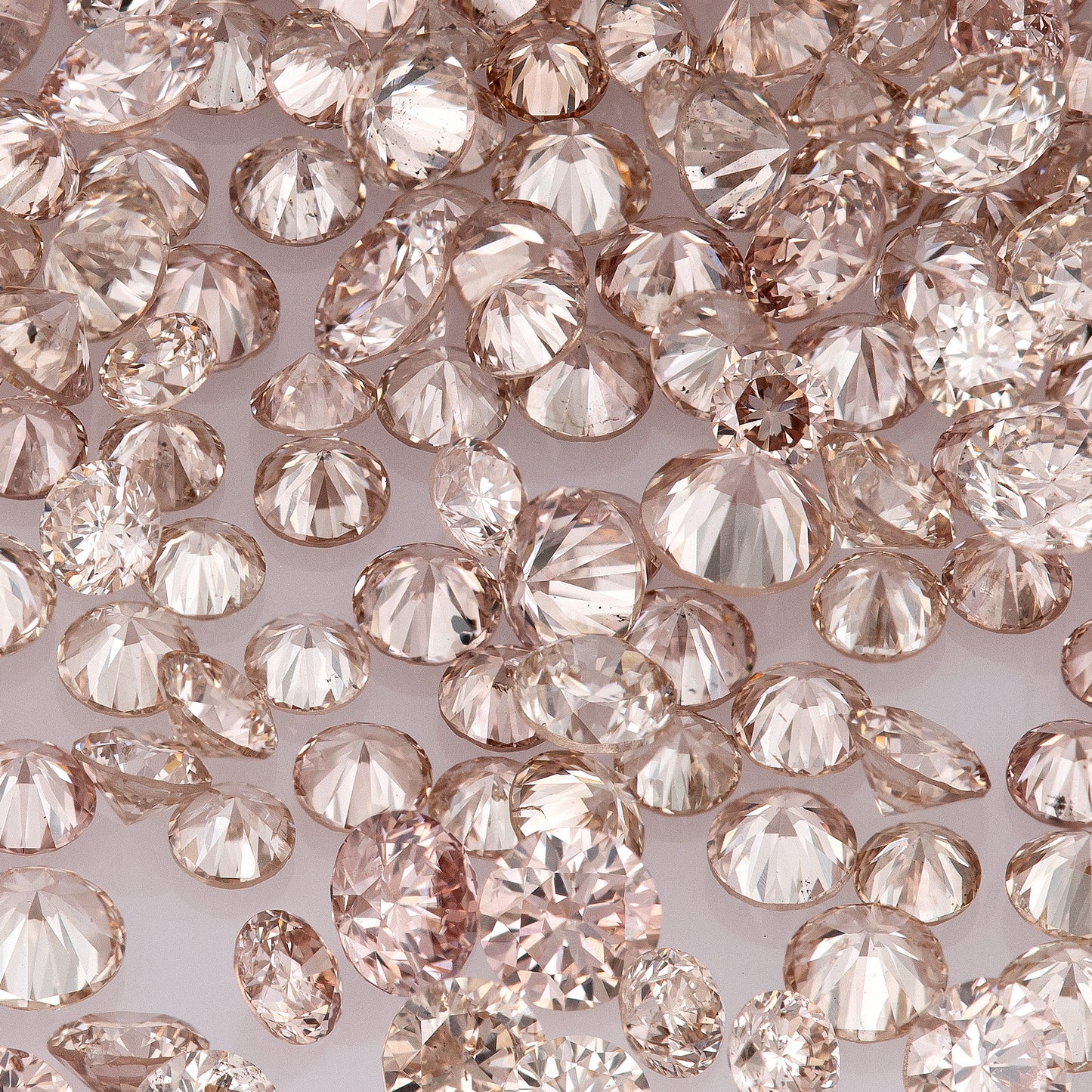 Fancy Pink Champagne PC1 | Argyle Pink Diamonds Select | Untreated Natural Pink Diamonds | Round Melee Accents
