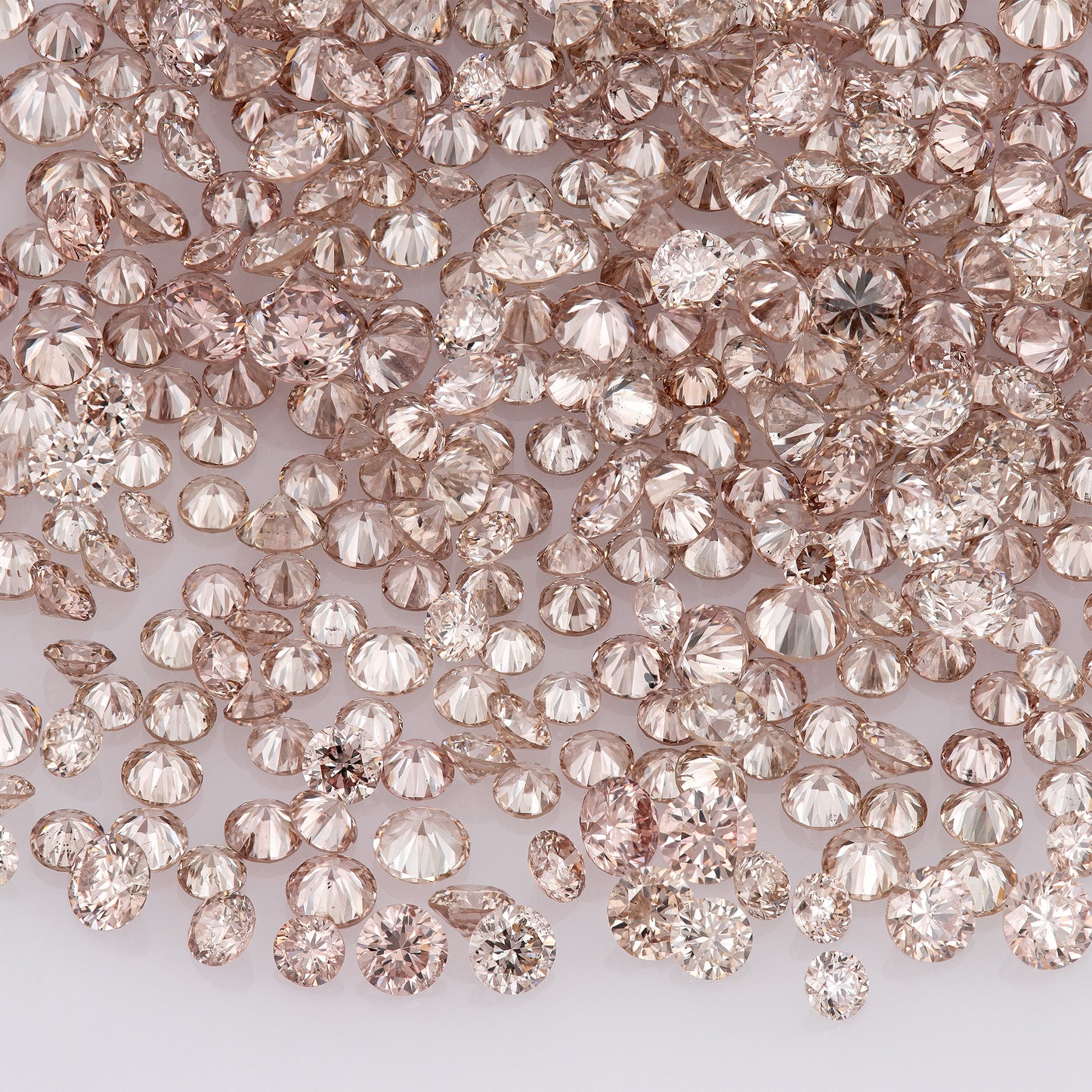Fancy Pink Champagne PC1 | Argyle Pink Diamonds Select | Untreated Natural Pink Diamonds | Round Melee Accents