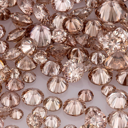 Fancy Intense Pink Champagne PC1/2 | Argyle Pink Diamonds Select | Chocolate Argyle Pink Diamond | Untreated Natural Pink Diamond | Round Melee Accents