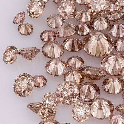 Fancy Intense Pink Champagne PC1/2 | Argyle Pink Diamonds Select | Chocolate Argyle Pink Diamond | Untreated Natural Pink Diamond | Round Melee Accents