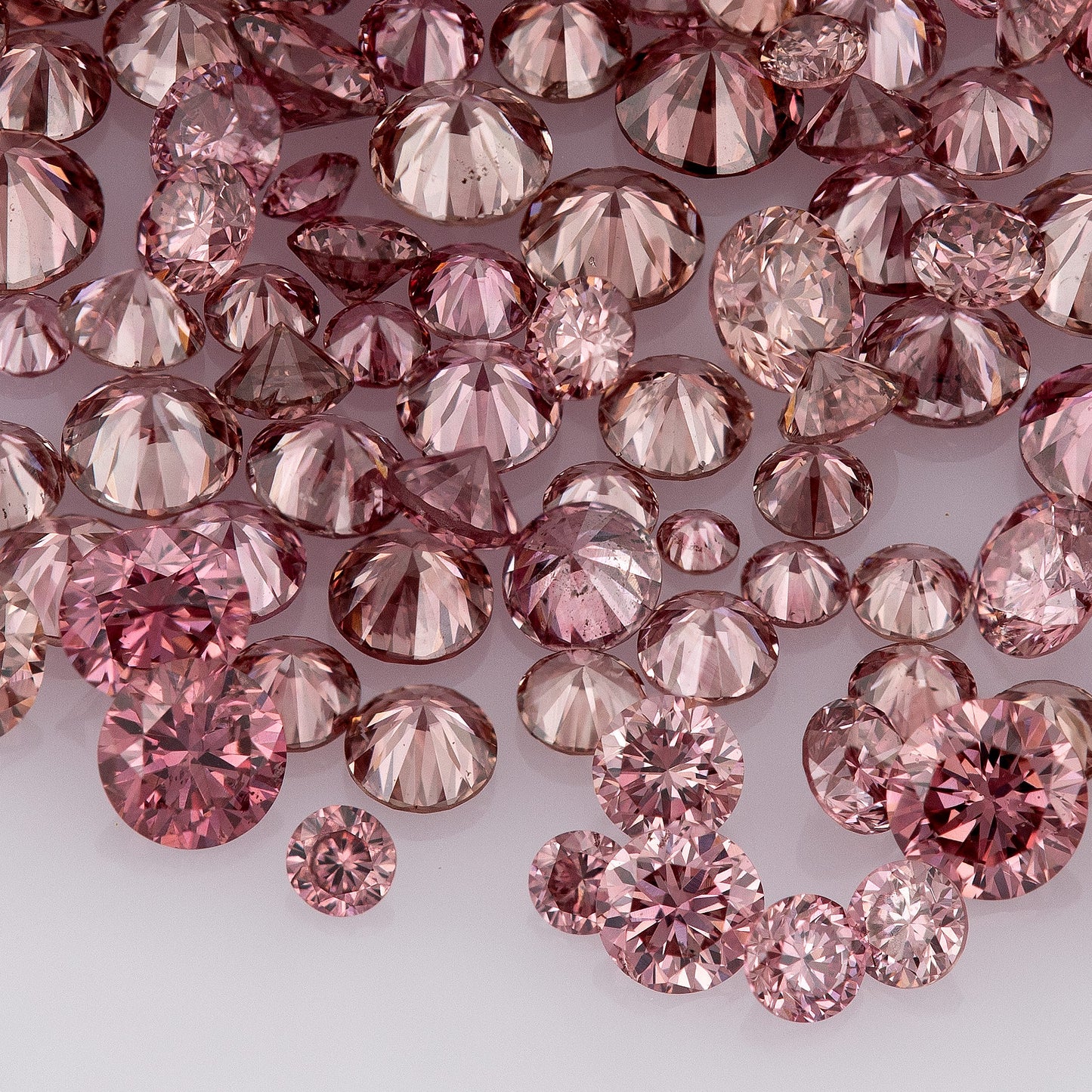 Fancy VIVID Reddish/Pink Rose Argyle (PR5-3 - PC2-3) | Argyle Pink Diamonds Select | Untreated Natural Pink Diamond | Round Melee Accents