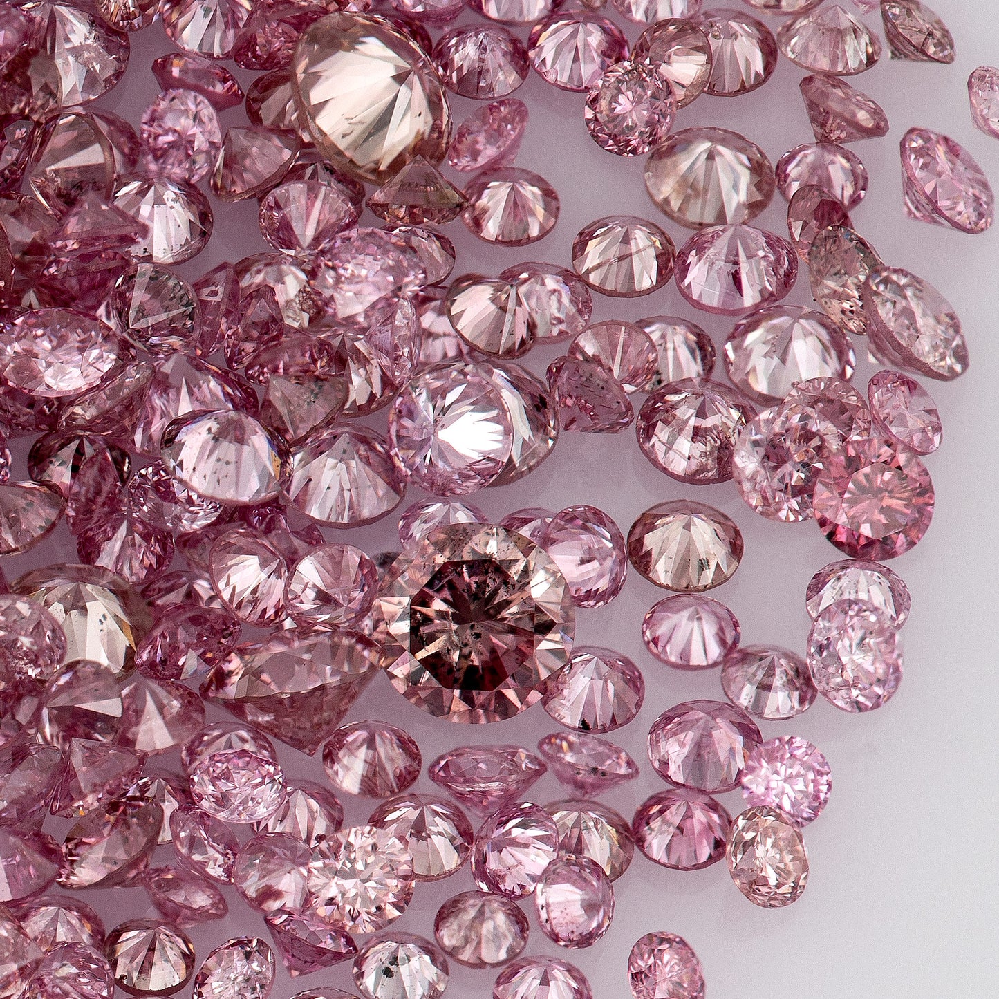 Fancy Intense/Vivid Pink 5-2P | Argyle Pink Diamonds | Natural Untreated | Round Melee Accents | Argyle
