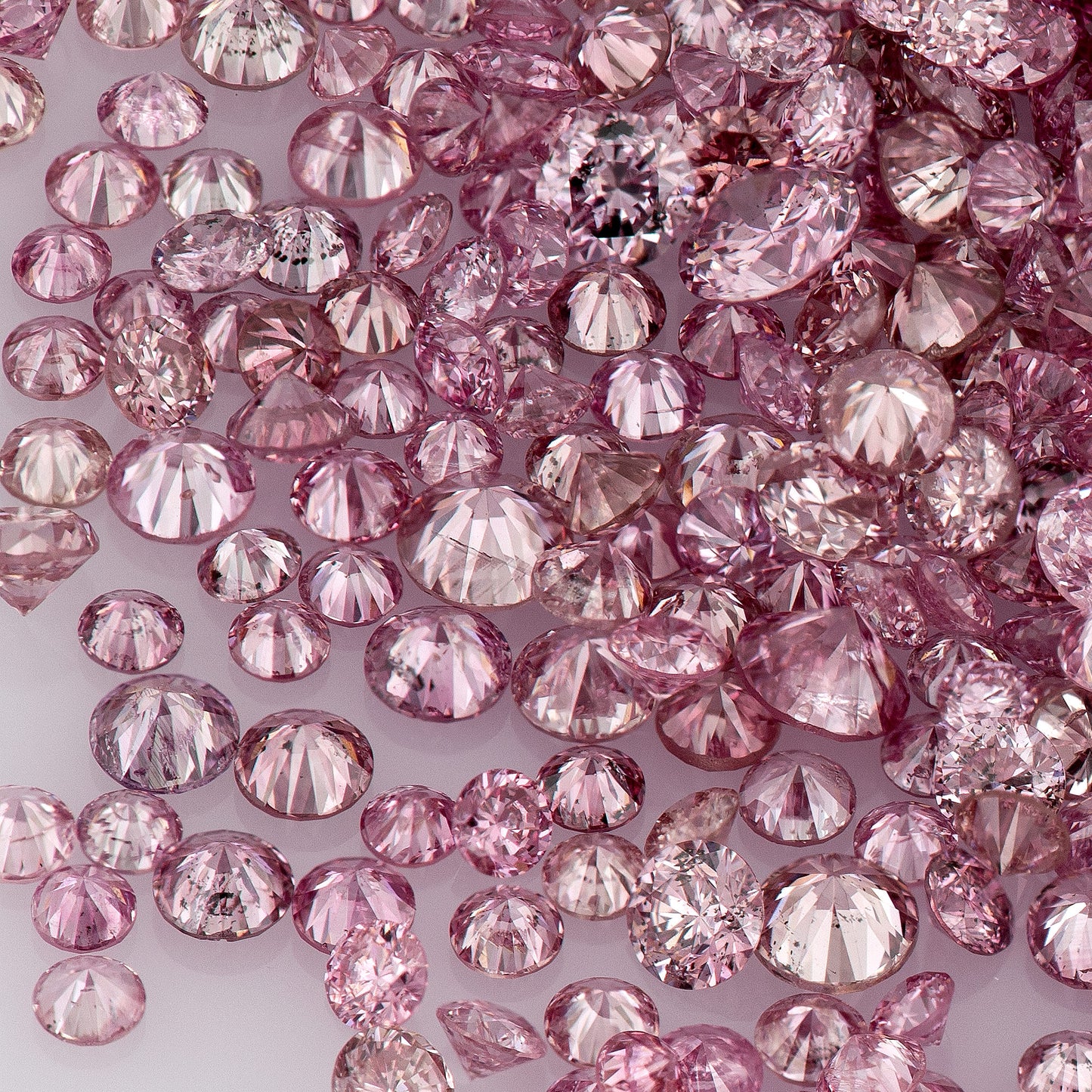 Fancy Intense/Vivid Pink 5-2P | Argyle Pink Diamonds | Natural Untreated | Round Melee Accents | Argyle