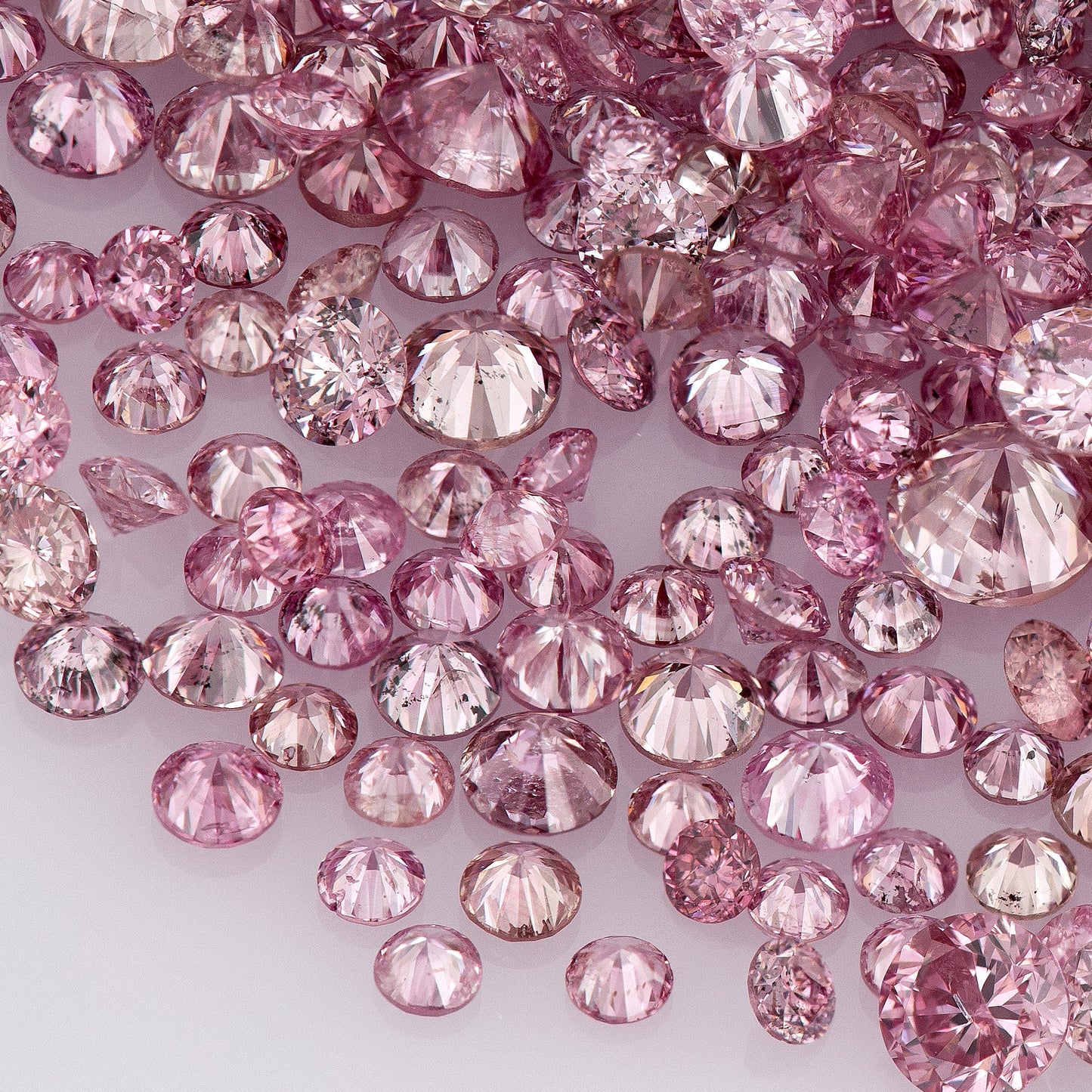 Fancy Intense/Vivid Pink 5-2P | Argyle Pink Diamonds | Natural Untreated | Round Melee Accents | Argyle