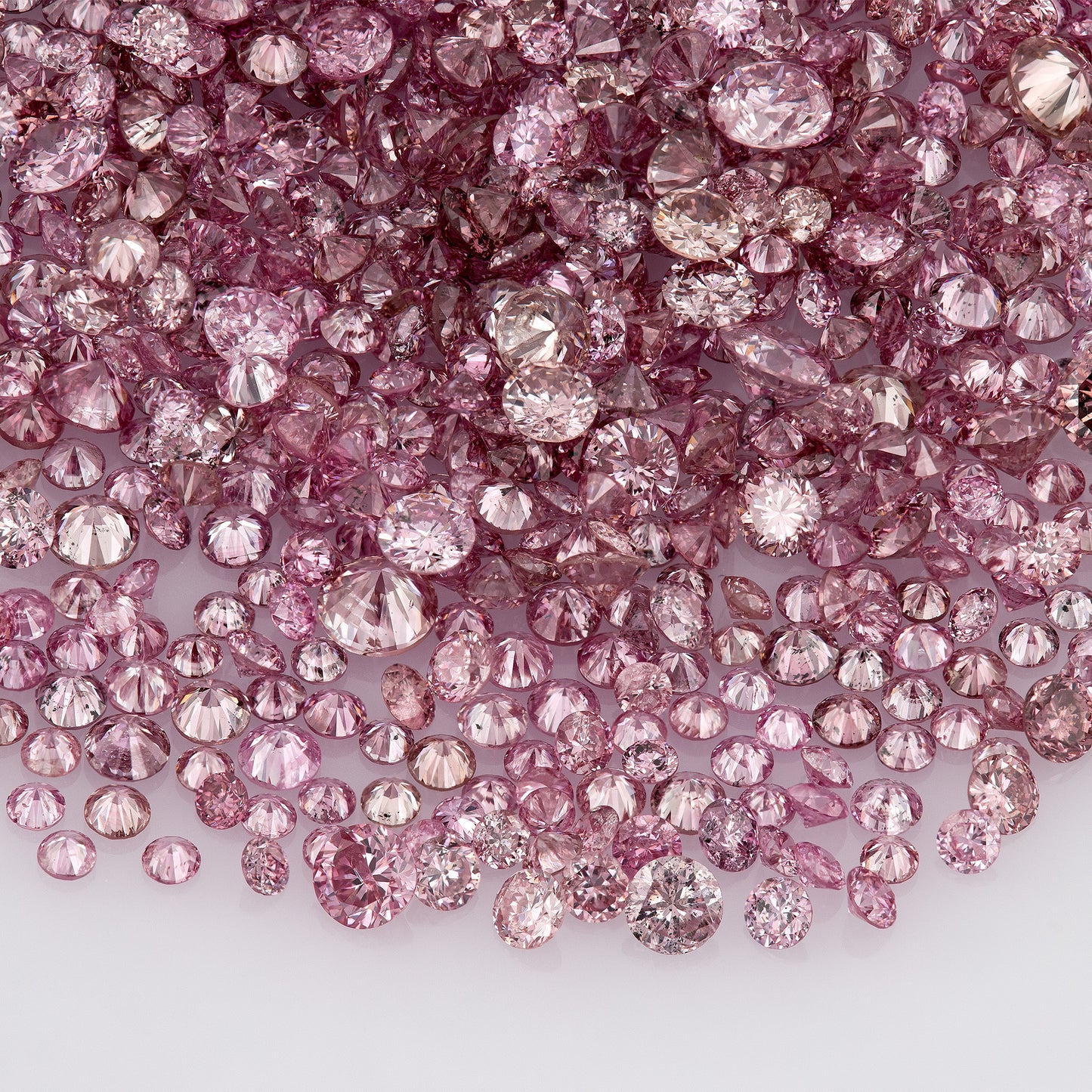 Fancy Intense/Vivid Pink 5-2P | Argyle Pink Diamonds | Natural Untreated | Round Melee Accents | Argyle
